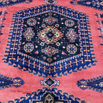 Persian Vise rug 7'2"x9'6", close-up of central dark navy medallion on red