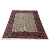 Vintage Arak Boteh Mir Rug, front perspective view of the complete rug, hand-knotted wool pile. SKU PP 100232.
