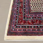 Vintage Arak Boteh Mir Rug, corner, border and fringe detail, hand-knotted wool pile. SKU PP 100232.