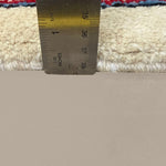 Vintage Arak Boteh Mir Rug, side-on pile and edge detail with a ruler, hand-knotted wool pile. SKU PP 100232.