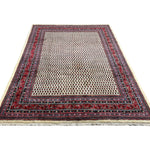 Vintage Arak Boteh Mir Rug, full rug in perspective showing the patterned field and borders, hand-knotted wool pile. SKU PP 100232.