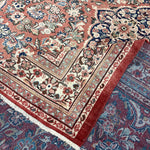 Persian Mahal rug with red border, multicolor floral field and layered ornamental stripes