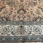 Persian Tabriz rug border and fringe, beige field with navy floral bands