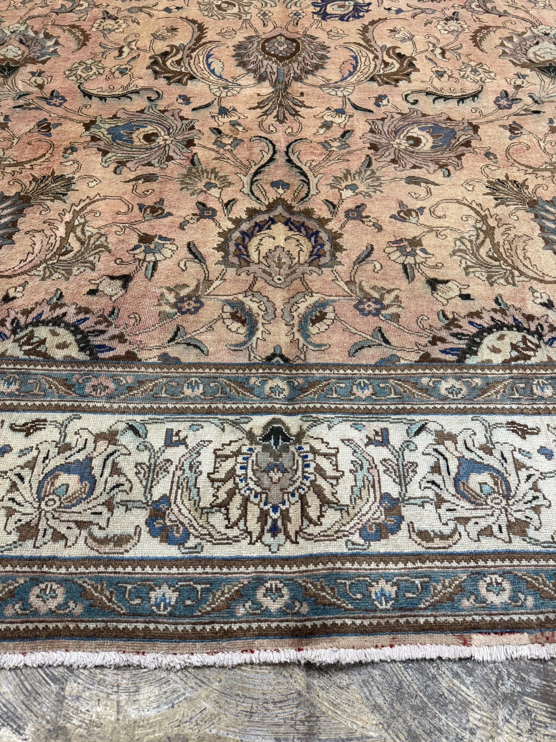 Persian Tabriz rug border and fringe, beige field with navy floral bands