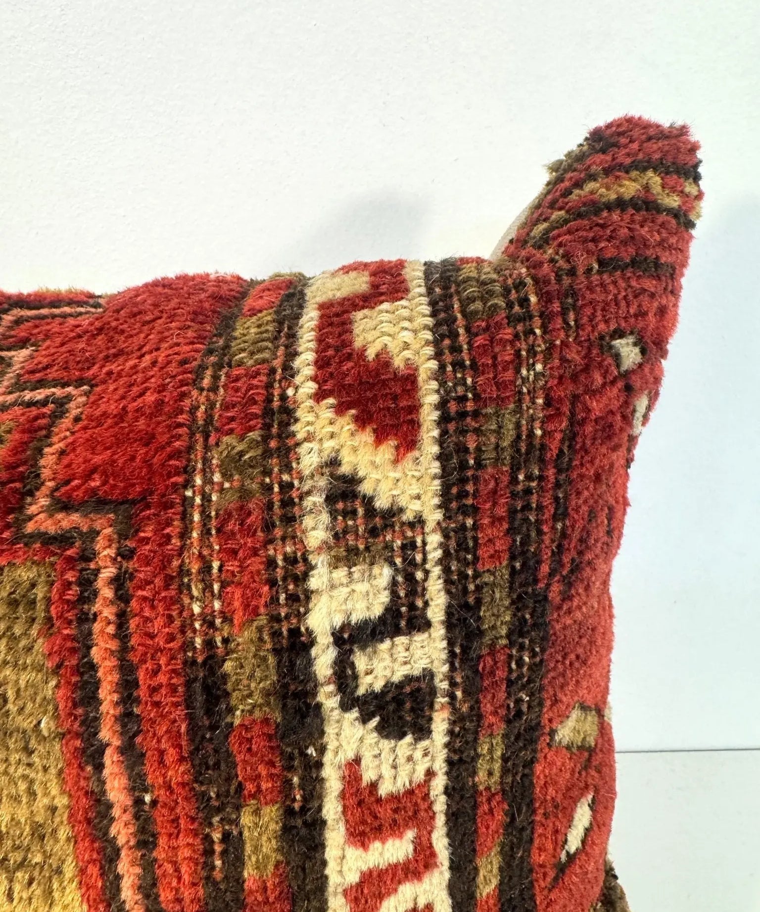 16 x 16 woven throw pillow cover with red and olive geometric patterns, fringed edge