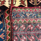 Vintage Saveh Runner — Light Florals Along a Dark Medallion, Framed in Red. Original rug photograph; SKU RR32282; source RR 32282 IMG_6932.