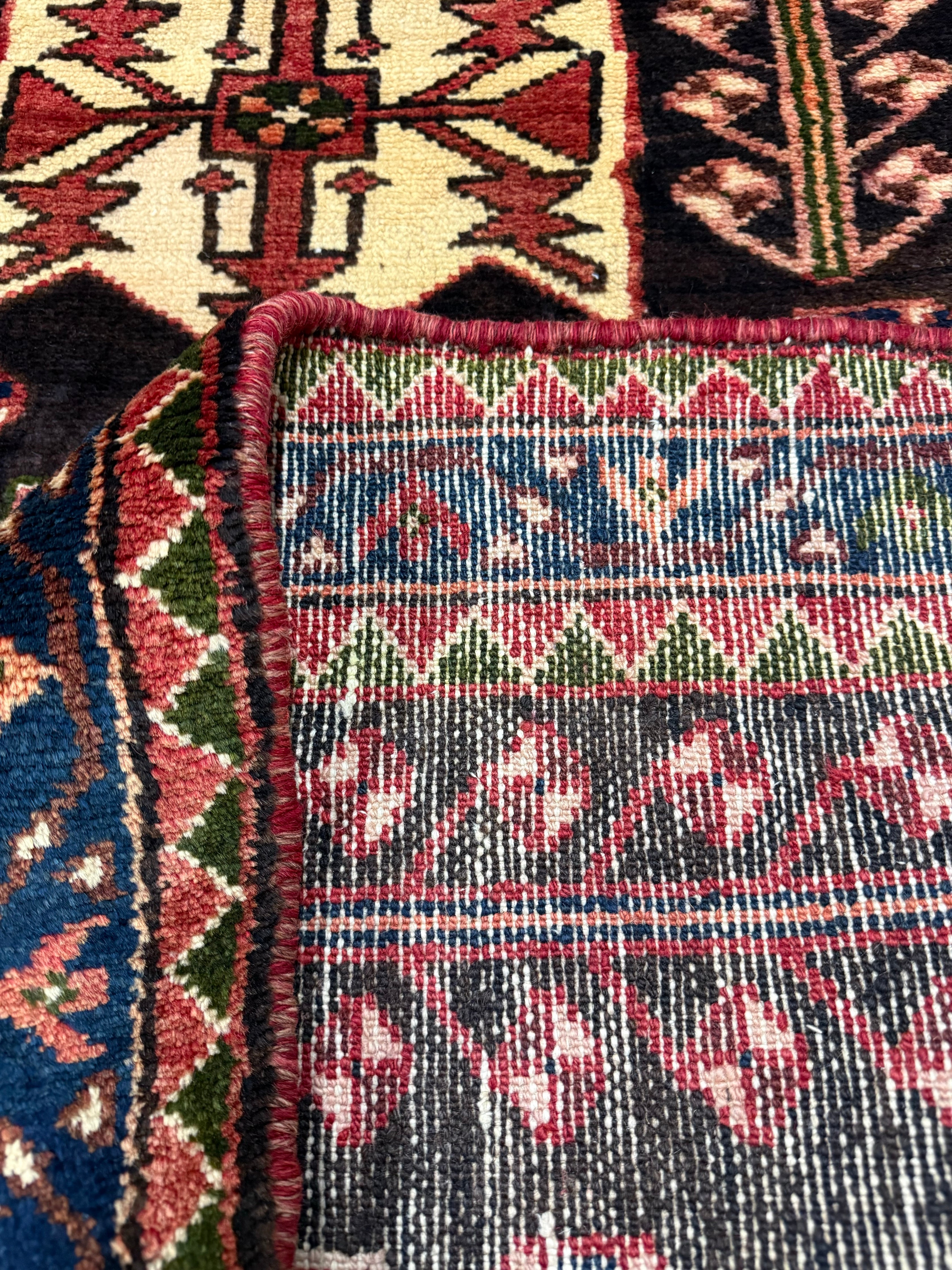 Vintage Saveh Runner — Light Florals Along a Dark Medallion, Framed in Red. Original rug photograph; SKU RR32282; source RR 32282 IMG_6932.