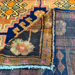 Vintage Luri Rug — Three Angular Medallions on Warm Orange. Original rug photograph; SKU RR32364; source IMG_6950.
