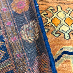 Vintage Luri Rug — Three Angular Medallions on Warm Orange. Original rug photograph; SKU RR32364; source IMG_6952.