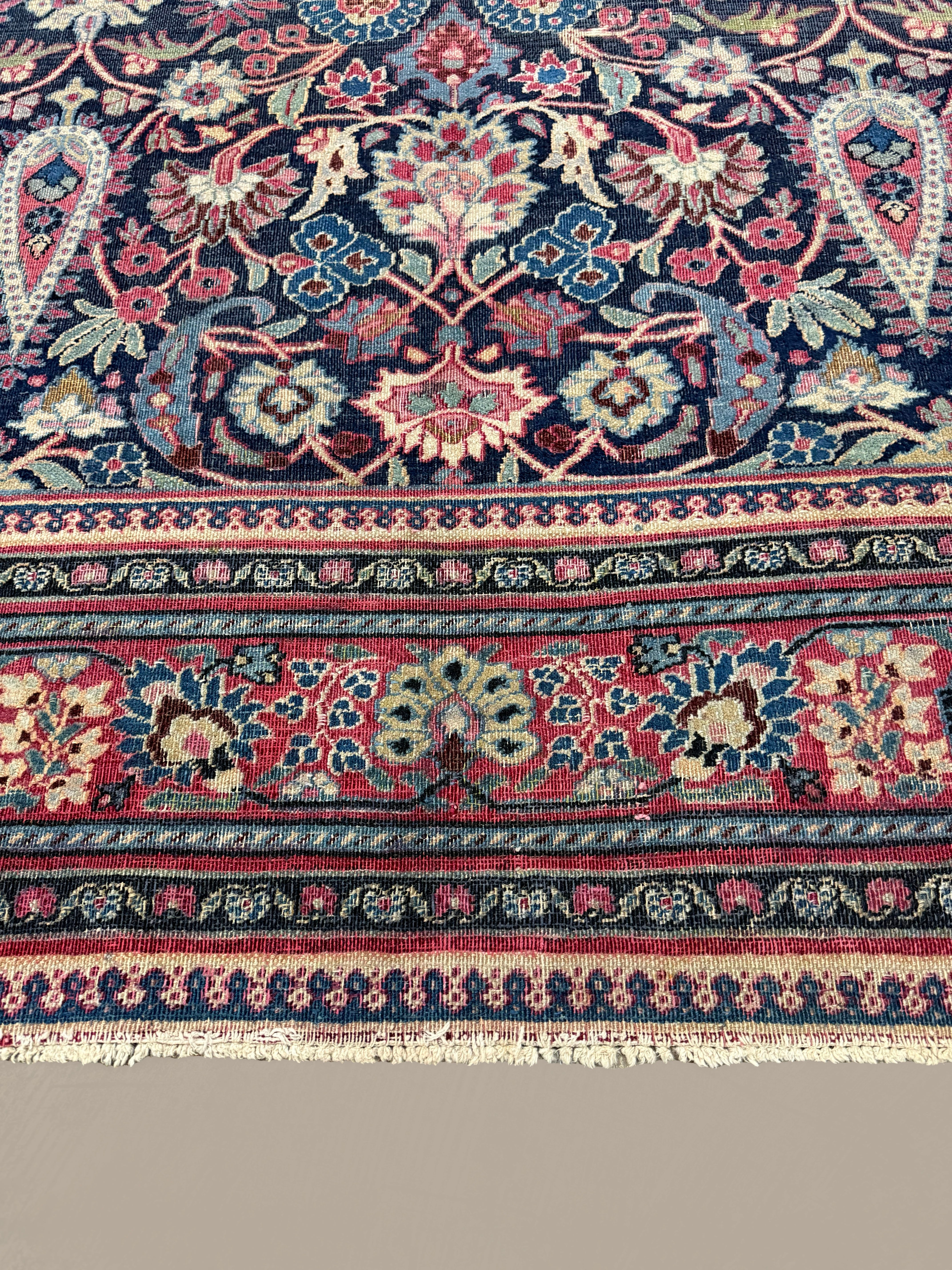Vintage Mashhad Khorasan Rug, close-up of the border and fringe, hand-knotted wool pile. SKU RR 30636.