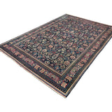 Vintage Mashhad Khorasan Rug, angled view showing the full field and borders, hand-knotted wool pile. SKU RR 30636.