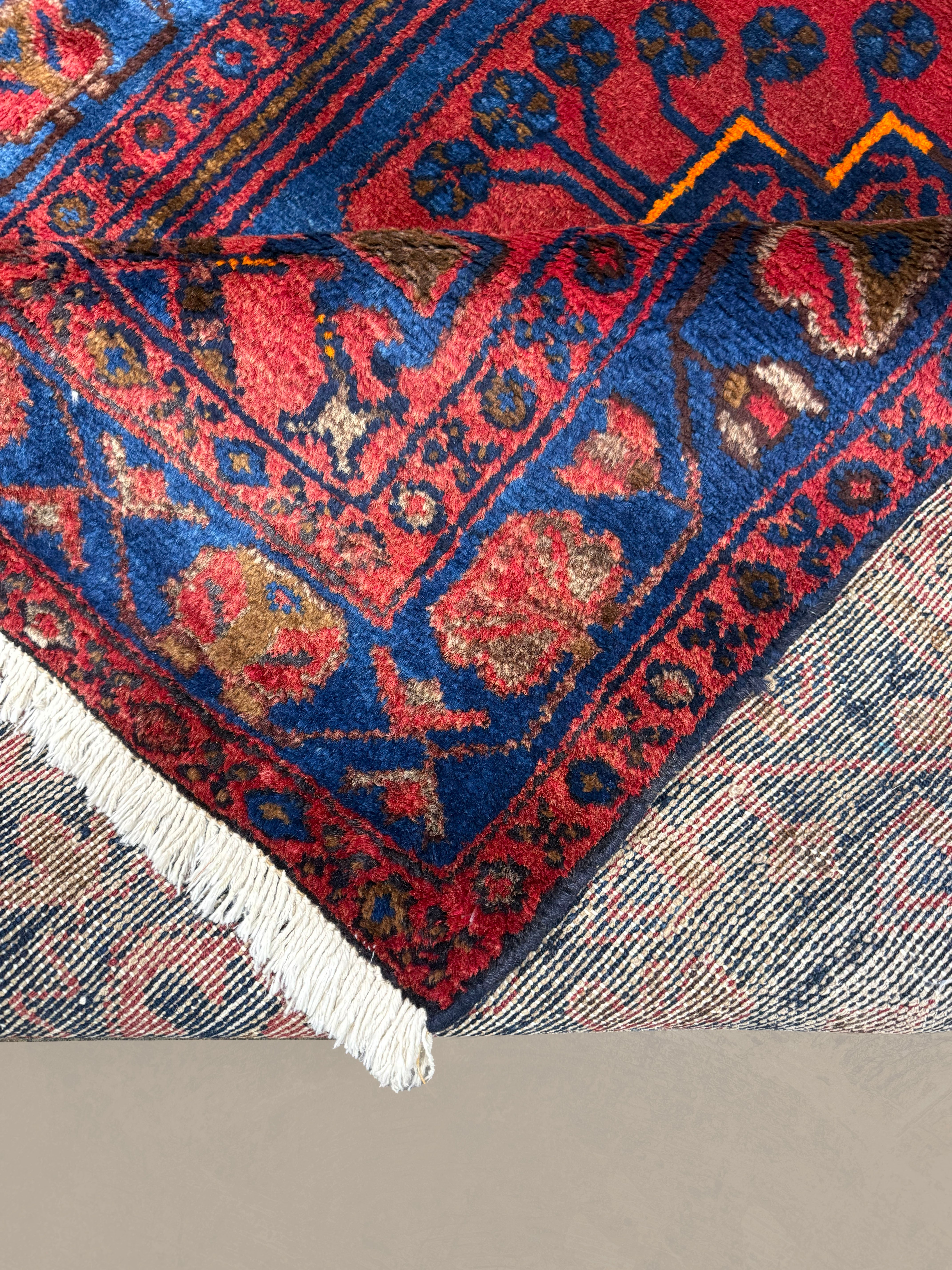 Persian Sonqor Runner, folded corner and reverse, hand-knotted wool with red colouring. SKU RR 30722.
