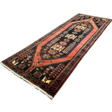Persian Saveh Runner, diagonal full view, hand-knotted wool with red colouring. SKU RR 32282.
