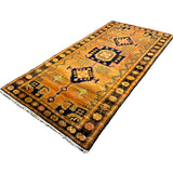 Persian Luri Rug, diagonal full view, hand-knotted wool with orange colouring. SKU RR 32364.