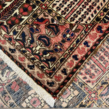 Persian Shalamzar Bakhtiari Rug, folded corner and reverse, hand-knotted wool with red colouring. SKU RR 32416.