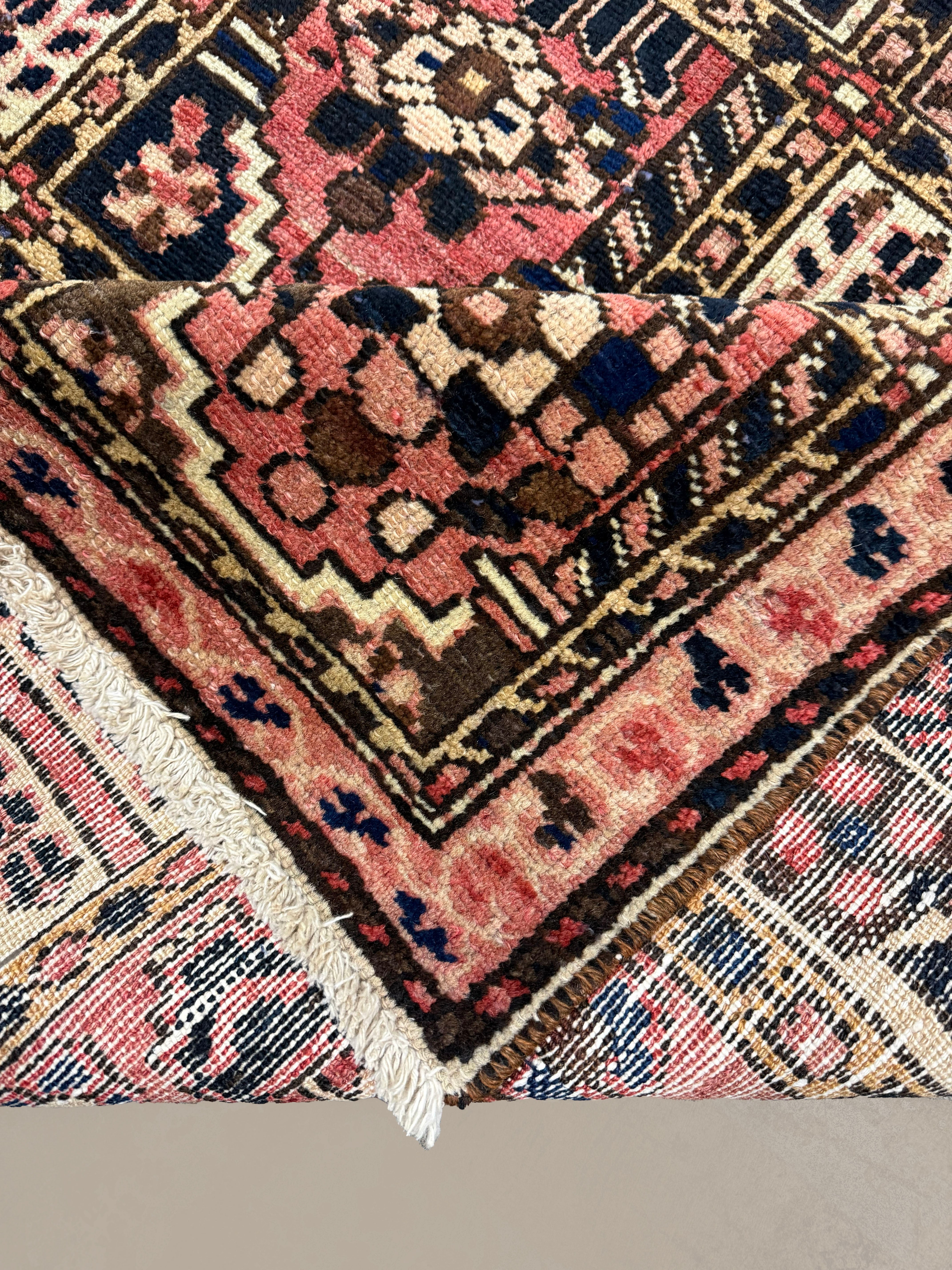Persian Shalamzar Bakhtiari Rug, folded corner and reverse, hand-knotted wool with red colouring. SKU RR 32416.