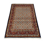 Persian Moud Birjand Rug, lengthwise view, hand-knotted wool with beige colouring. SKU RR 32434.