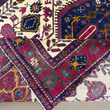 Vintage Sirjan Luri Afshar Rug, close-up of the patterned corner and edge, hand-knotted wool pile. SKU RR 32447.
