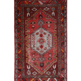 Persian Zanjan Rug, top view on white background, hand-knotted wool with red colouring. SKU RZ 101.