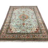 Vintage Tabriz Rug, full rug in perspective showing the patterned field and borders, hand-knotted wool pile. SKU RZ 5000.