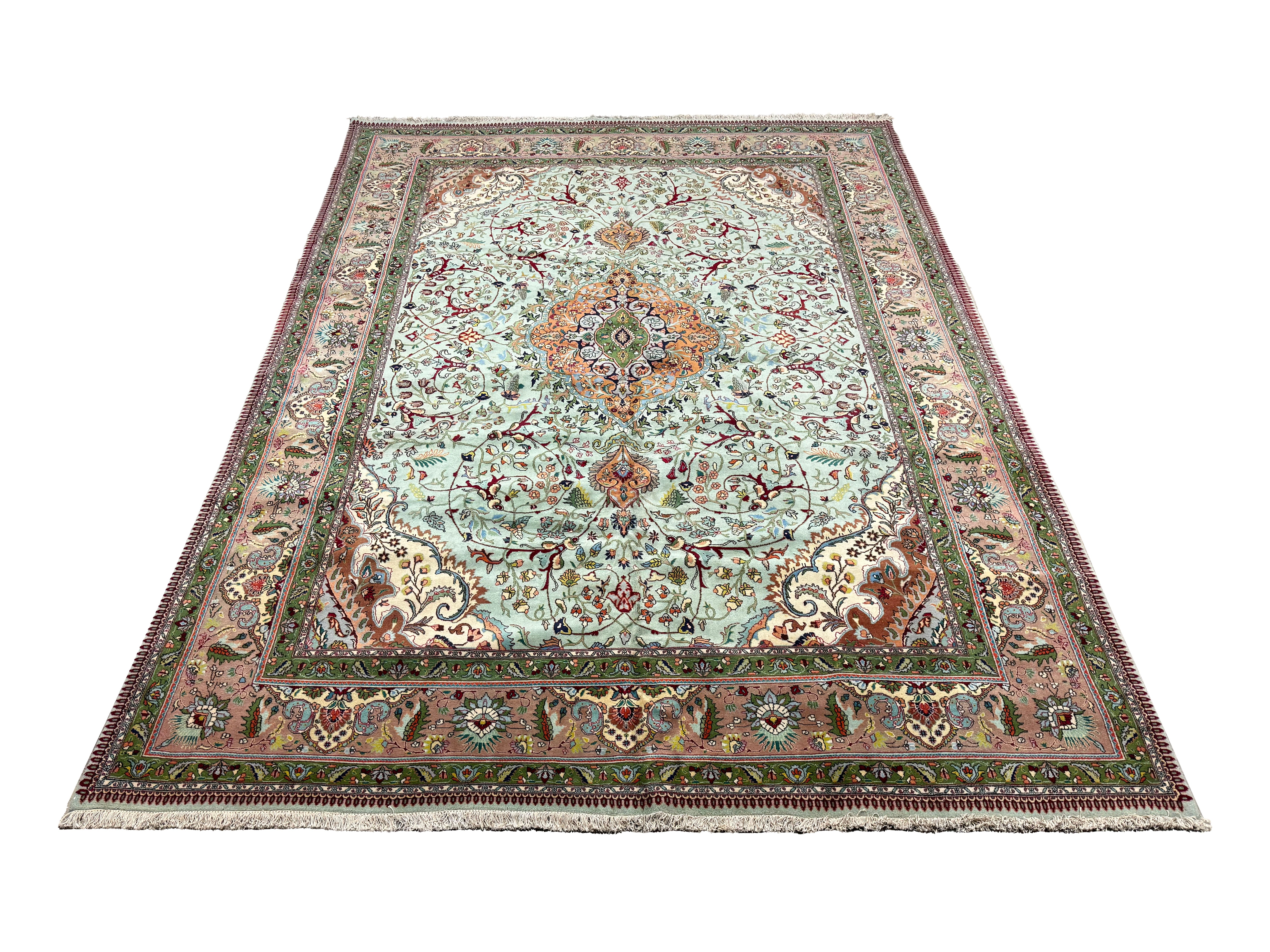 Vintage Tabriz Rug, full rug in perspective showing the patterned field and borders, hand-knotted wool pile. SKU RZ 5000.