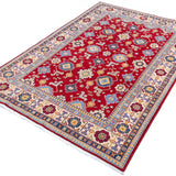 Full view at an angle of red & blue Kazak-inspired wool rug 21542.