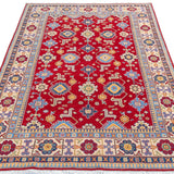 Full view from a low angle of red & blue Kazak-inspired wool rug 21542.