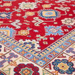 Folded edge and wool pile of red & blue Kazak-inspired wool rug 21542.