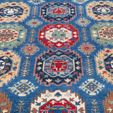 Pattern detail of blue & red Kazak-inspired wool rug 29635.