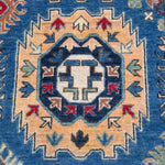 Pattern detail of blue & red Kazak-inspired wool rug 29635.