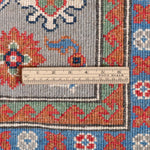 Wool pile close-up of blue & red Kazak-inspired wool rug 29345.