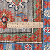 Wool pile close-up of blue & red Kazak-inspired wool rug 29345.