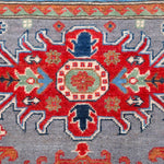 Pattern detail of blue & red Kazak-inspired wool rug 29345.