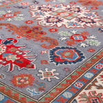 Pattern detail of blue & red Kazak-inspired wool rug 29345.