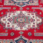 Pattern detail of red & blue Kazak-inspired wool rug 21613.