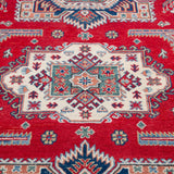 Pattern detail of red & blue Kazak-inspired wool rug 21613.