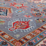 Pattern detail of blue & red Kazak-inspired wool rug 29339.