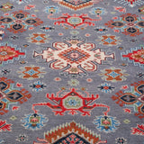 Pattern detail of blue & red Kazak-inspired wool rug 29339.