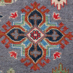 Pattern detail of blue & red Kazak-inspired wool rug 29339.