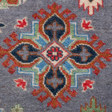 Pattern detail of blue & red Kazak-inspired wool rug 29339.