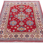 Full view from a low angle of red & ivory Kazak-inspired wool rug 21991.