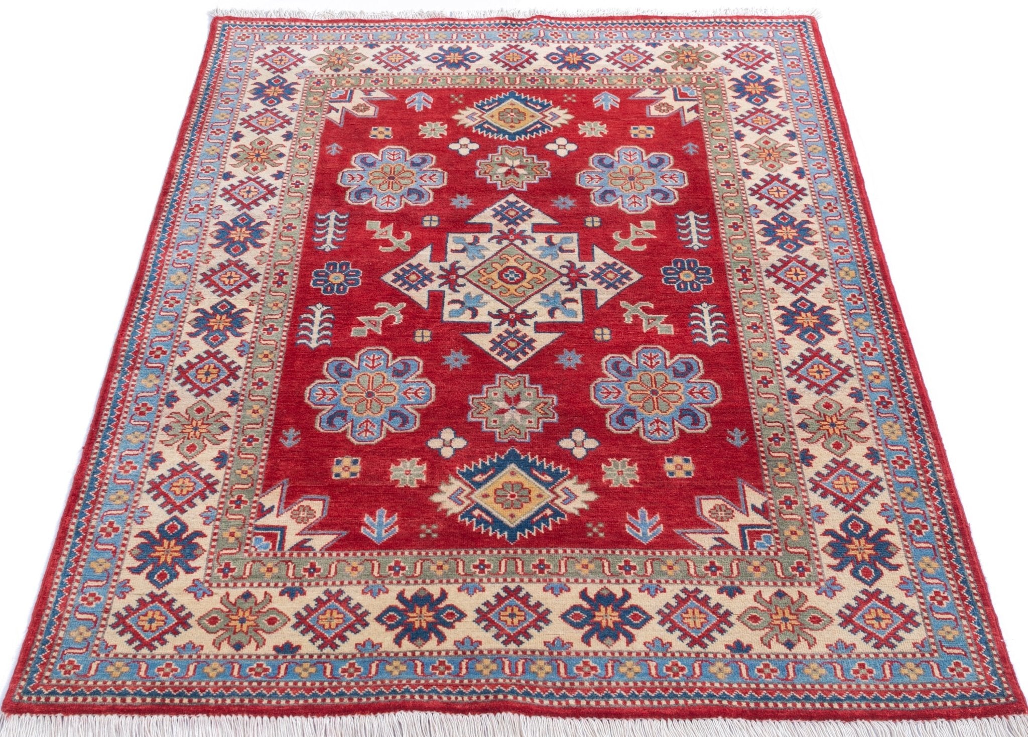 Full view from a low angle of red & ivory Kazak-inspired wool rug 21991.