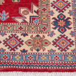 Border and edge detail of red & ivory Kazak-inspired wool rug 21991.