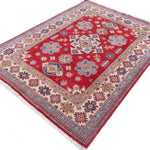 Full view at an angle of red & ivory Kazak-inspired wool rug 21991.