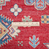 Wool pile close-up of red & ivory Kazak-inspired wool rug 21991.