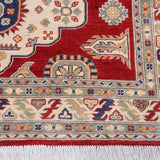 Border and edge detail of red & ivory Kazak-inspired wool rug 22082.