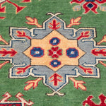 Pattern detail of green & red Kazak-inspired wool rug 29641.