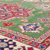 Pattern detail of green & red Kazak-inspired wool rug 29641.