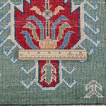 Wool pile close-up of green & ivory Kazak-inspired wool rug 29640.