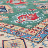 Pattern detail of green & ivory Kazak-inspired wool rug 29640.